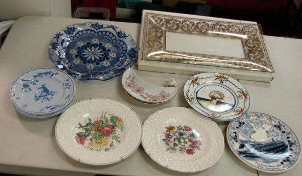 12 piece Porcelain & Glass Collection incl. Delft: 4 Delft looking plates by Longchamps in France (purch. at Bloomies for $175), 2 Spode plates, blue glass plate, gold decorated platter 20" l, a Delft decorator plate, 2 curved plates, Royal Albert min