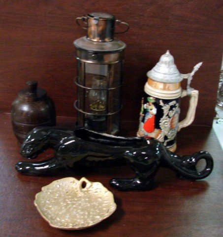 Lot: Panther Planter, German stein, lantern: Box lot consisting of a retro black panther planter, a German lidded stein, a lantern, a covered wooden jar and a small gold plate.