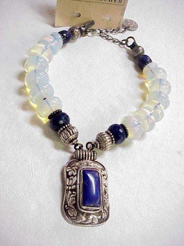 Masha Archer opaline,lapis necklace: Lady's beautiful Masha Archer necklace consisting of opaline rondelles, lapis gorget , sterling and large sterling pendant with lapis. 24" adjustable sister clasp with five kopek coin from Ukraine.