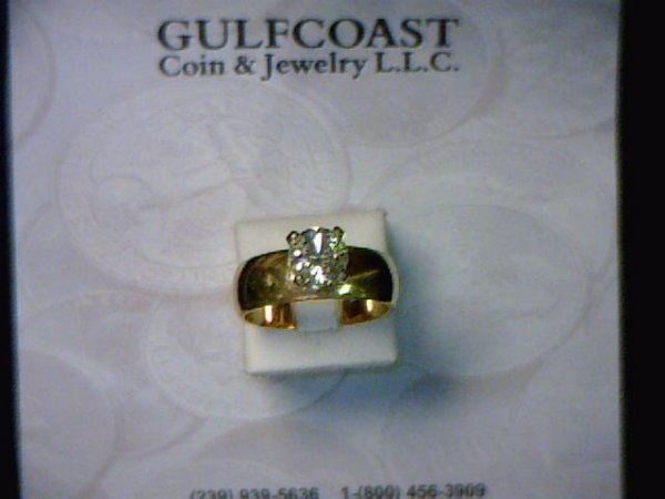 Lady's 14kyg diamond solitaire ring 1.14ct: Lady's 14kyg diamond solitaire ring 5.5 grams with one round full cut diamond 1.14ct in 4 prong setting with I1 clarity and H color. Band is 6mm wide and finger size 53/4.