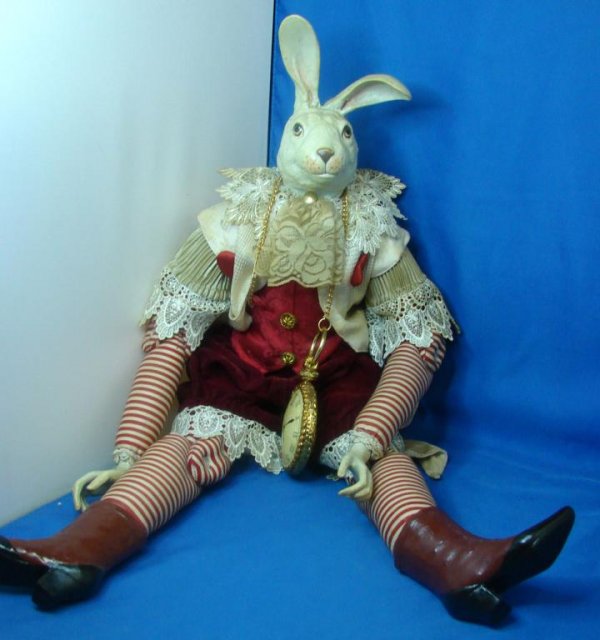 Alice in Wonderland Rabbit: He's late - he's late - for a very important date!! Alice in Wonderland Rabbit, 25" long, needs a bit of cleaning.