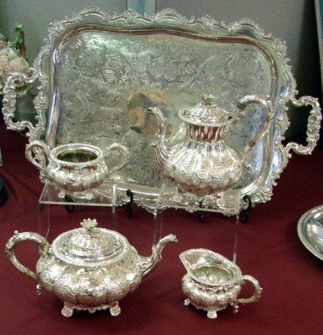 Sheffield Silver plate Tea Service C. H. Collins: Elaborate Sheffield Silver plate tea service, marked Made in England with the upright lion mark of Charles Howard Collins, which began making quality silver plate in 1889. There is some pitting on the