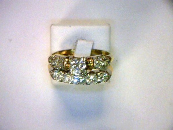 Lady's 14kyg vintage diamond bridal set: Lady's 14kyg diamond bridal set consisting of the engagement ring with one round European cut diamond approx. .50ct with VS2 clarity and G color with single cut diamonds on either side of center. Wedd