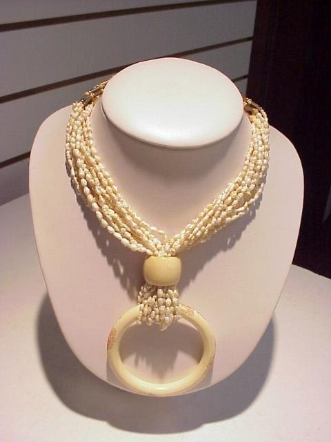 Ivory/rice pearl necklace by Masha Archer: Lady's modern Chinese ivory necklace with natural rice pearls, brass tubing, yak bone from Nepal and enameled Cloisonne ferrule sewing thimbles from China with sterling silver clasp.