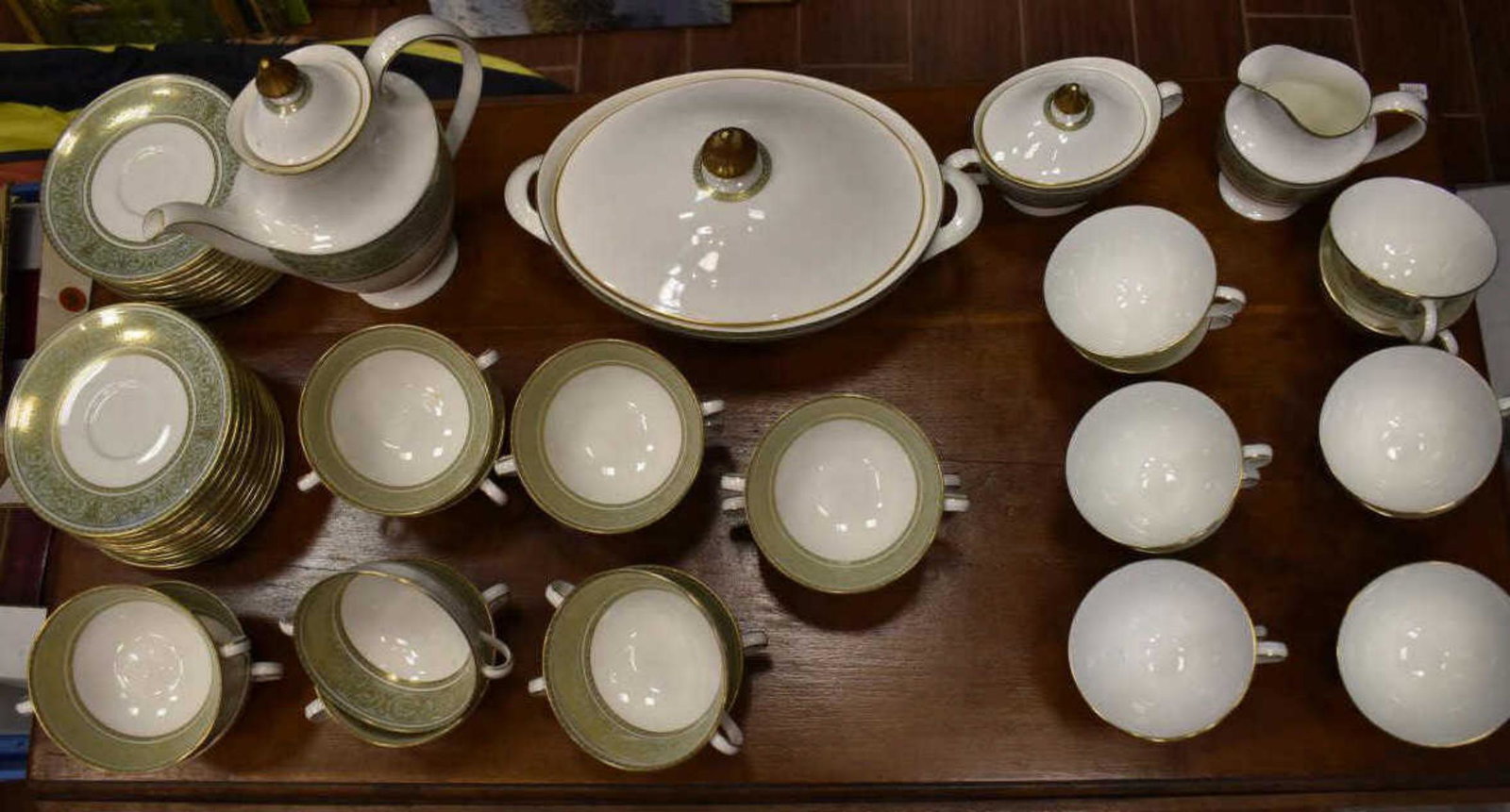 Royal Doulton English Renaissance Fine Bone China: Royal Doulton English Renaissance Fine Bone China. Gold scroll pattern on green trim with gold trim. This great partial set will include 1-Coffee pot with lid. 1-Creamer 5.25". 1-Sugar with lid 4.5". 