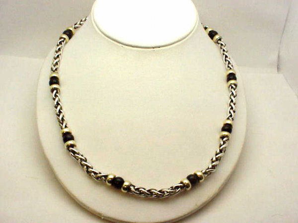 Sterling/14kyg John Hardy necklace: Sterling and 14kyg necklace by famous designer John Hardy consists of large foxtail links with onyx beads and 14kyg rondelles on either side. 18" in length and 75 grams.