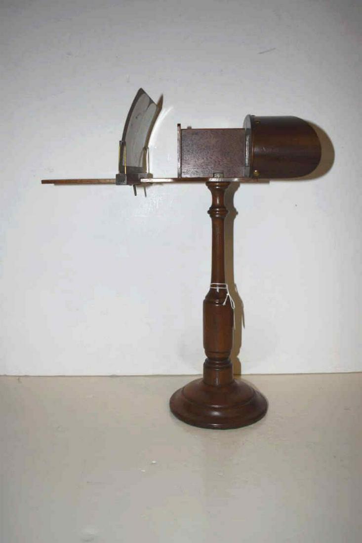 Antique Table Top Viewer: Antique Table Top Viewer. Maple and curly maple veneer with brass hardware and turned base, 14 1/2"h. Includes fifteen viewing cards, mostly comical genre scenes.
