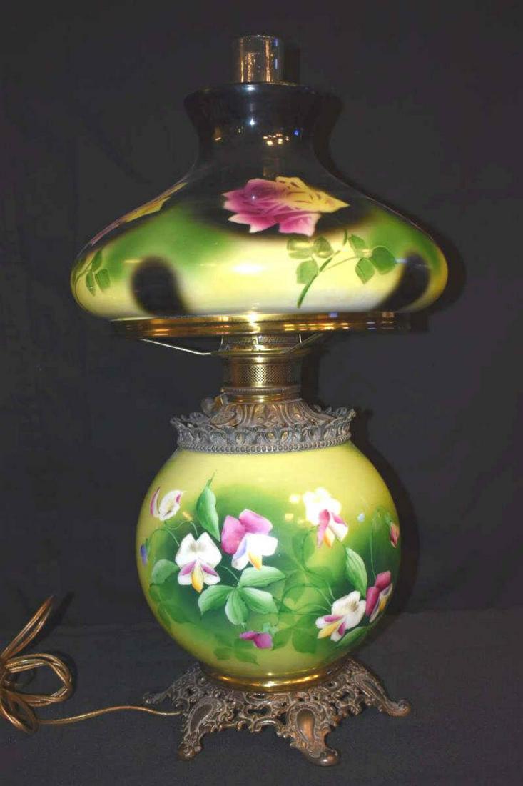 Gone With the Wind Lamp: Gone With the Wind Lamp. Converted, milk glass lamp with hand painted floral decoration and hurricane shade, unsigned, 23 1/2"h.