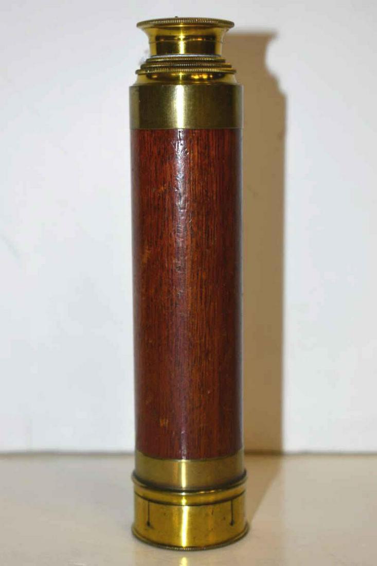 Antique Pocket Telescope: Antique Pocket Telescope. Likely a marine telescope in brass and maple with four sections, 6"l. closed, 16 1/2"l. expanded.