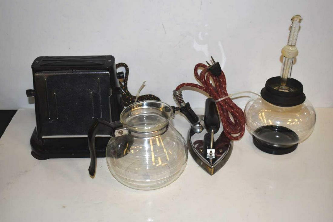 Lot Of Vintage Assorted Appliances: Lot Of Vintage Assorted Appliances. Total of 3 appliances in the lot. Consists of vintage toaster. Fiery Feather Iron. Vintage coffee pot with Cory Filter missing some of the accessories.