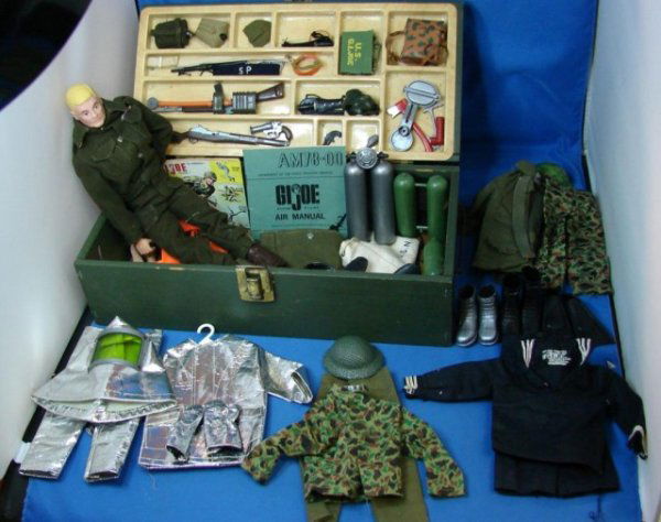 1960's GI Joe with Footlocker & Accessories: 1960's GI Joe with Footlocker & Accessories including a deep sea diving suit, two pair of camouflage outfits, a sailor suit, flippers, boots, Air Manual, etc.