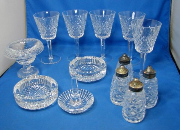 13 pcs. Waterford - Alana Wine, ashtrays, S&P +: 13 pcs. Waterford - 5 Alana Wine glasses, 2 have chips, 2 ashtrays, 4 S&P , footed dish 3 3/4" tall, and a ring holder.