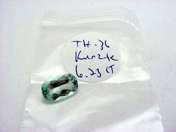 Loose green kunzite oval shape 6.23ct: Beautiful loose oval shaped green kunzite weighing 5.23ct with type 1 clarity and AAA color. Measures 14X9mm.