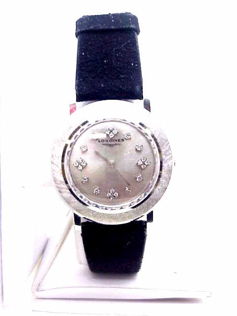 Man's 14kwg Longine diamond watch: Man's beautiful vintage 14kwg Longine diamond watch 27.7 grams with silver diamond dial, wind up mechanical movement, satin finished bezel and black suede band. Beautiful condition!
