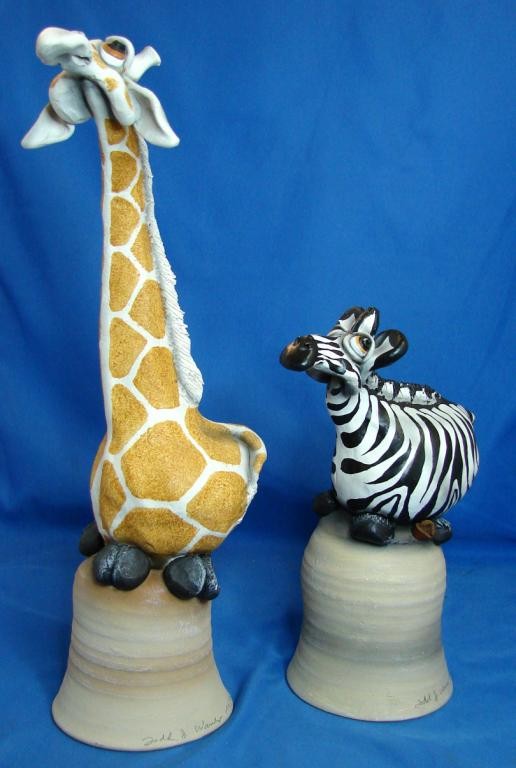 Todd Warner Dinner Bell - Giraffe & Zebra: Todd Warner, well known for his whimsical sculptures, hand signed giraffe and zebra dinner bells.