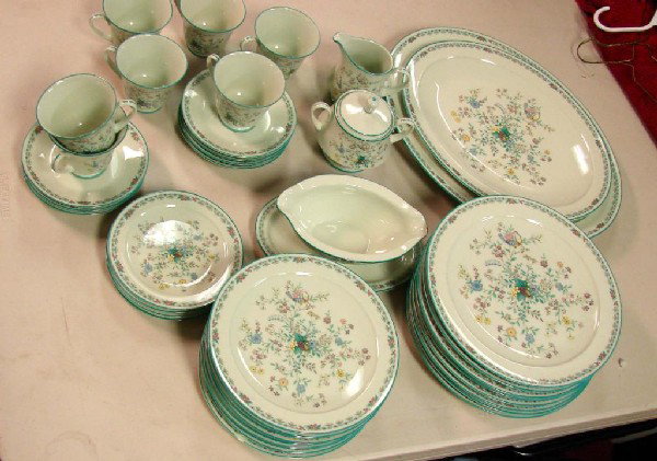 Noritake Paradise Dinnerware, Svc. for 8: Noritake Paradise Dinnerware: 8 dinner plates, 4 salad, 8 bread & butter, 8 cups & saucers, 2 platters, gravy, sugar and creamer. We see one chip on largest platter and one salad plates. Set Sold AS I