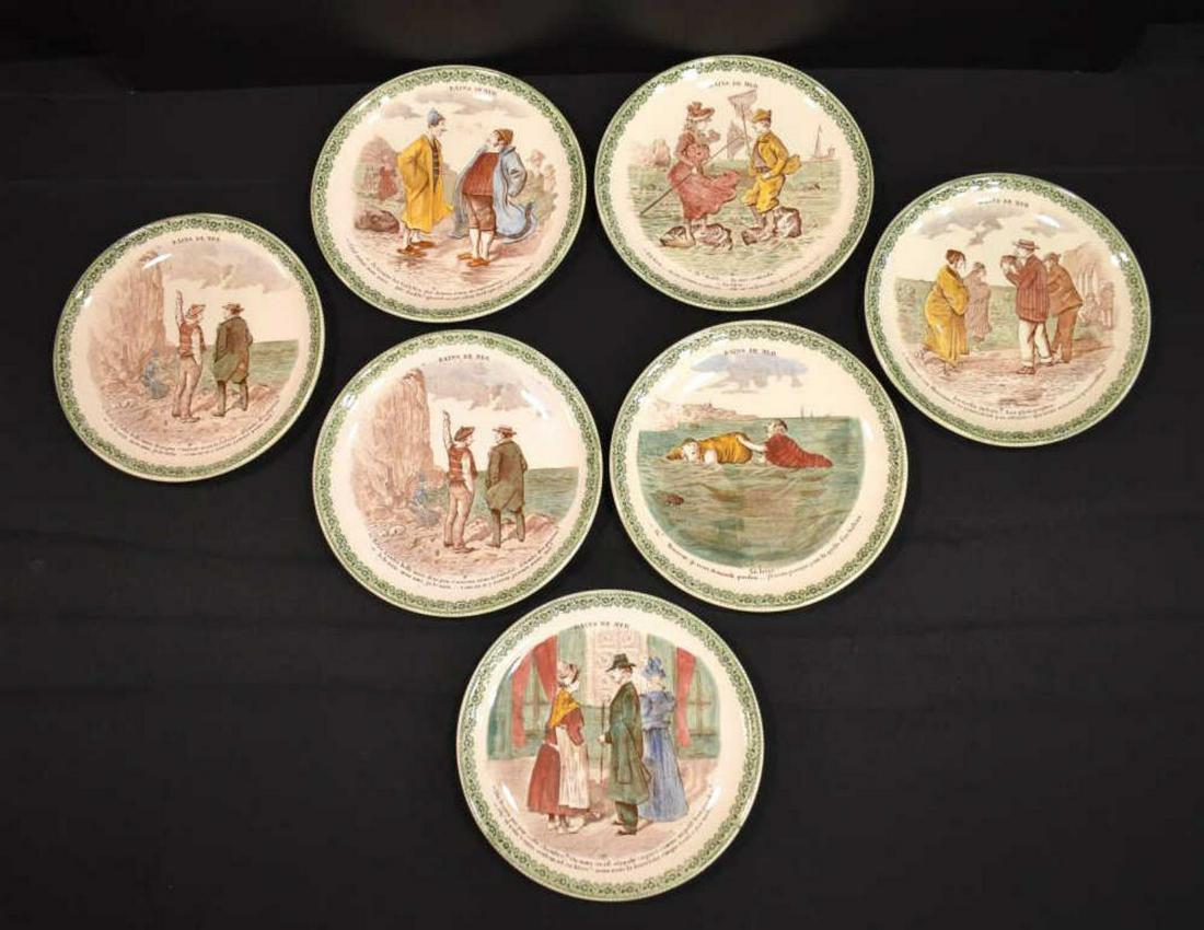 Seven Hautin & Boulanger Transferware Plates: Seven Hautin & Boulanger Transferware Plates. Sea Bathing theme plates (Bains De Mer) with green floral borders and marked "France- Terre De Fer- H.B. & Cie", 7 3/4"dia.