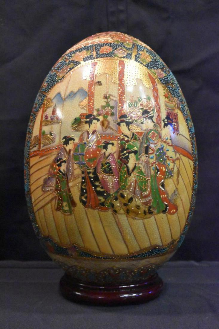 Satsuma Egg on Stand: Satsuma Egg on Stand. Porcelain with traditional enameled decoration, signed "Made in China-Satsuma", 13 1/4"h. on stand.