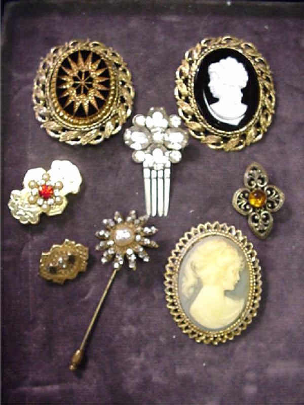 Lot of costume jewelry Miriam Haskel: Lot of costume jewelry including cameo, hair and enamel pins, pendant and floral pin with pearl by Miriam Haskel.