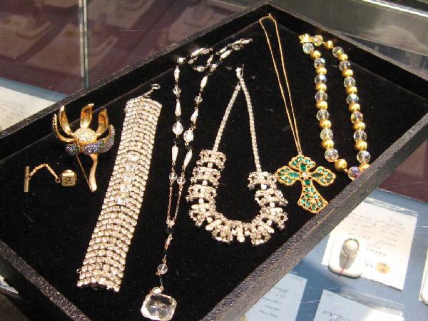 Lot of costume jewelry including Weiss: Lot of costume jewelry including Weiss rhinestone bracelet, Bergere necklace with crystals, movable floral pin by Les Bernard and others. Nice lot!