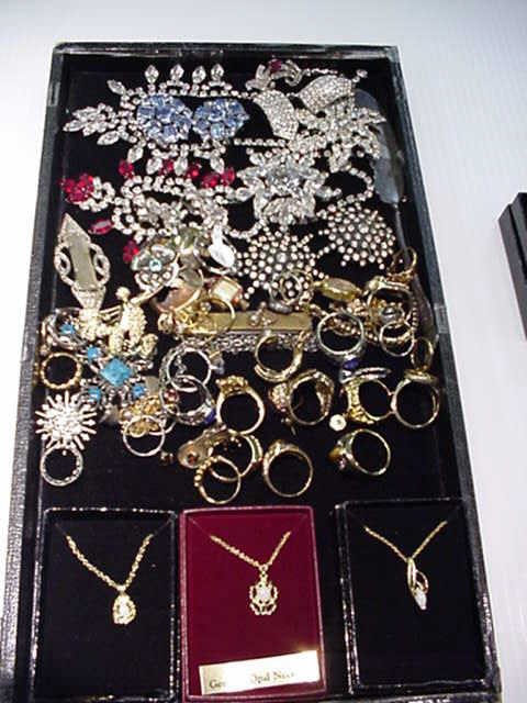 Lot of costume jewelry including Weiss: Lot of costume jewelry including Weiss rhinestone, opal, ruby and turquoise and Great American Presidents Collections from the National Historic Mint.