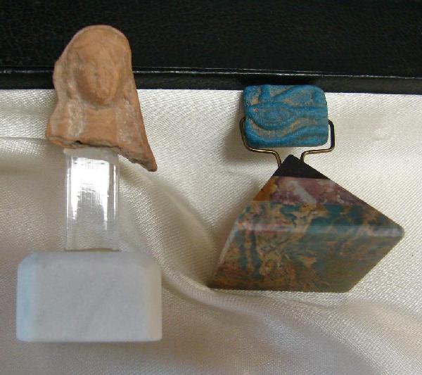 Greek Terracotta Head &Egyptian Faience Amulet: Greek Terracotta Head Fragment, Hellenistic period, 3rd C BC, 1 1/8", and an Egyptian Faience Amulet Eye of Horus 2/3", with COA from Zeus Antiquities in Ca.