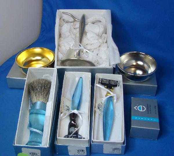 Shave Inc. Accessories: Stand, 2 Razors, Brush & 2: Shaving Accessories from Shave Inc., France: Nickel Stand, 3 clear blue handled razors, matching brush, & 2 Shaving Bowls, and a Alum Block; all items new in boxes (with price tags attached).