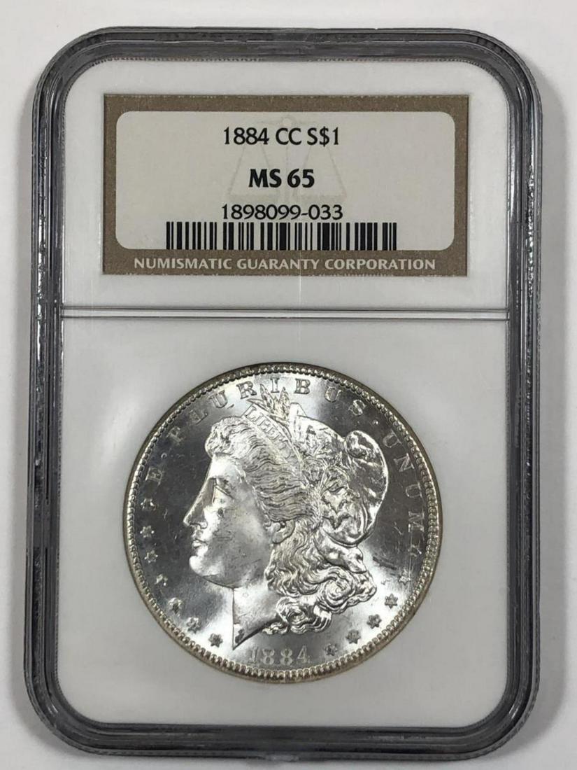 1884-CC Morgan Silver $1 Carson City NGC MS65 (1 of 3)