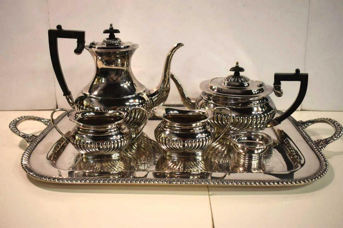 Sheffield Silver Plated Tea/Coffee Set: Sheffield Silver Plated Tea/Coffee Set. Consists of creamer, sugar, Tea & Coffee Pot. Comes with a silver tray that is not Sheffield. Also included is a Christofle Tea Strainer. Christofle etching loc