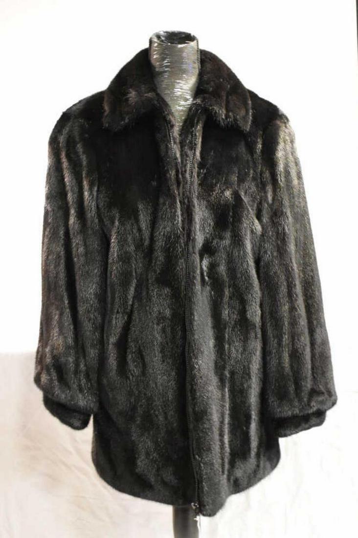 Ladies Black Mink Stroller Length Fur Coat: Ladies Black Mink Stroller Length Fur Coat by Marco Donatello from Fur Distinction Ltd. Fully lined, zipper front closure, two wait exterior pockets & one interior pocket. Padded shoulder with 24" arm