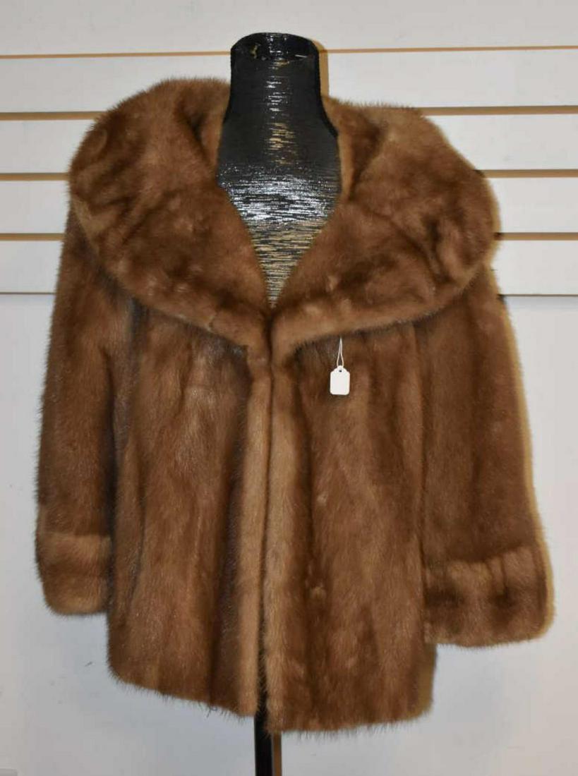 Ladies Vintage Carmel Colored Mink Jacket: Ladies Vintage Carmel Colored Mink Jacket, Fully Lined with Round Collar, two front waist pockets, one hook & loop closure. Good condition. Flared 27" sleeves, 23" hem to collar, 18" arms, 50" sweep,
