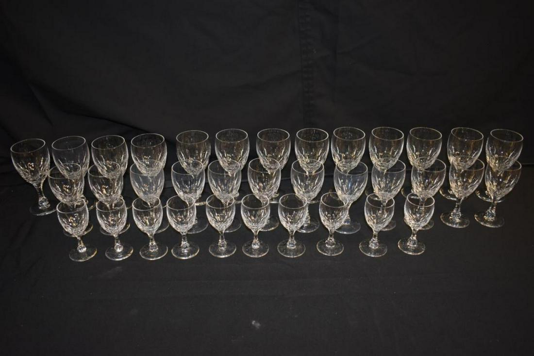 Set of Kosta-Boda Stemware, Fontain Clear Pattern: Set of Kosta-Boda Stemware, Fontain Clear Pattern. Thirteen wines, 6 3/4"h., twelve water goblets, 6"h. and ten cordials, 4 3/4"h. Some cloudiness.