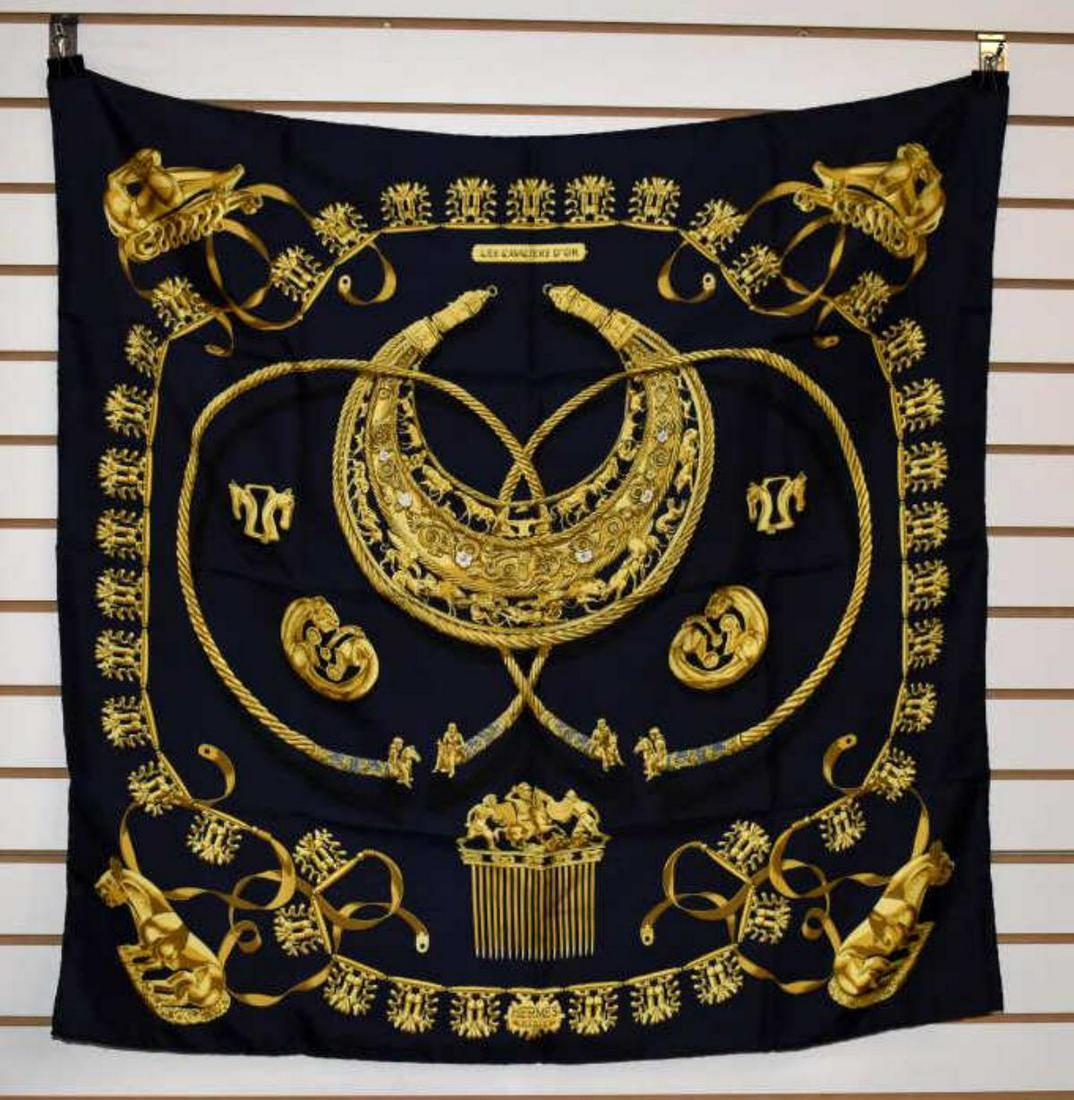 Pair Of Hermes Silk Scarves: Pair Of Hermes Silk Scarves. "Les Cavaliers D'Or gold silk scarf. "Crown/Couronnes" Julie Abadle original silk scarf issue 1969. Both measures 35"x35".