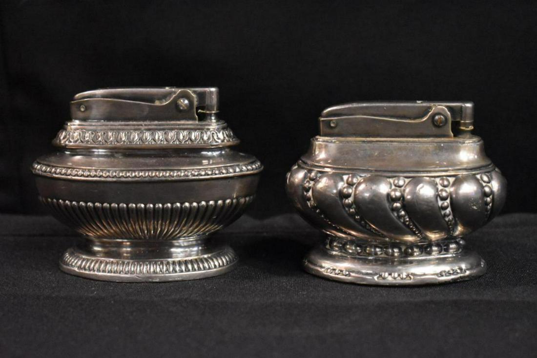 Pair Of Vintage Ronson Table Lighters: Pair Of Vintage Ronson Table Lighters. Silver plated lighters. Vintage 1950's "Crown" table lighter. Vintage "Queen Anne" torch lighter. Both need fluid. They are in good condition.