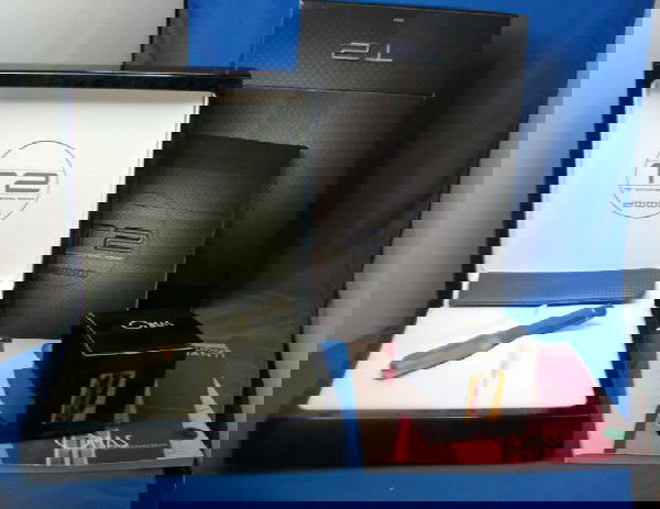 OMAS T2 Titanium Paragon Fountain Pen & Ink: OMAS T2 Paragon Fountain Pen, w/Greek Key design is cut from solid piece of titanium. Based on the Paragon, this 12 sided pen is light & strong. 75th anniversary ltd. ed, 5 5/8" long, OMAS notebook an