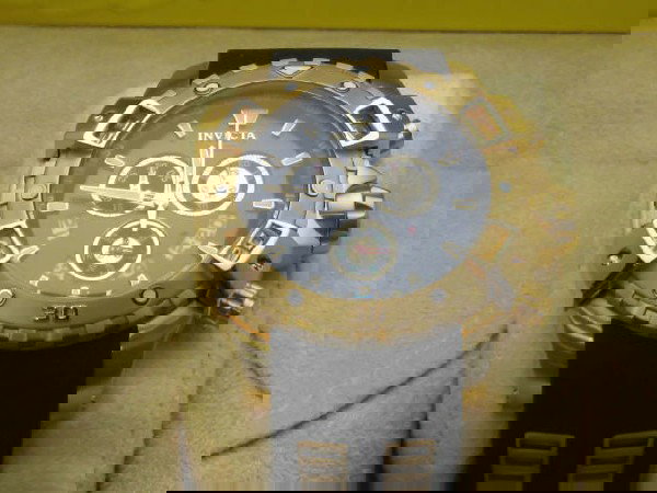 Invicta Sea Thunder chronograph watch: Man's Invicta Sea Thunder Chronograph watch water resistant to 300m, flame-fusion crystal and Swiss movement. Comes with box and papers. Never been used.