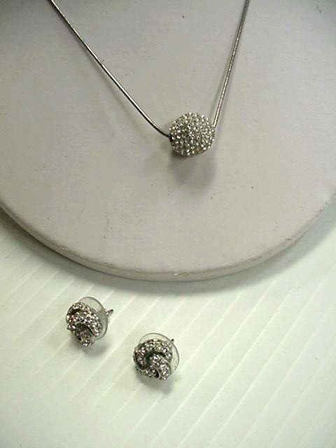 Crystal ball necklace by Swarovski: Crystal ball necklace by Swarovski with sterling adjustable snake chain and matching crystal knot earrings.