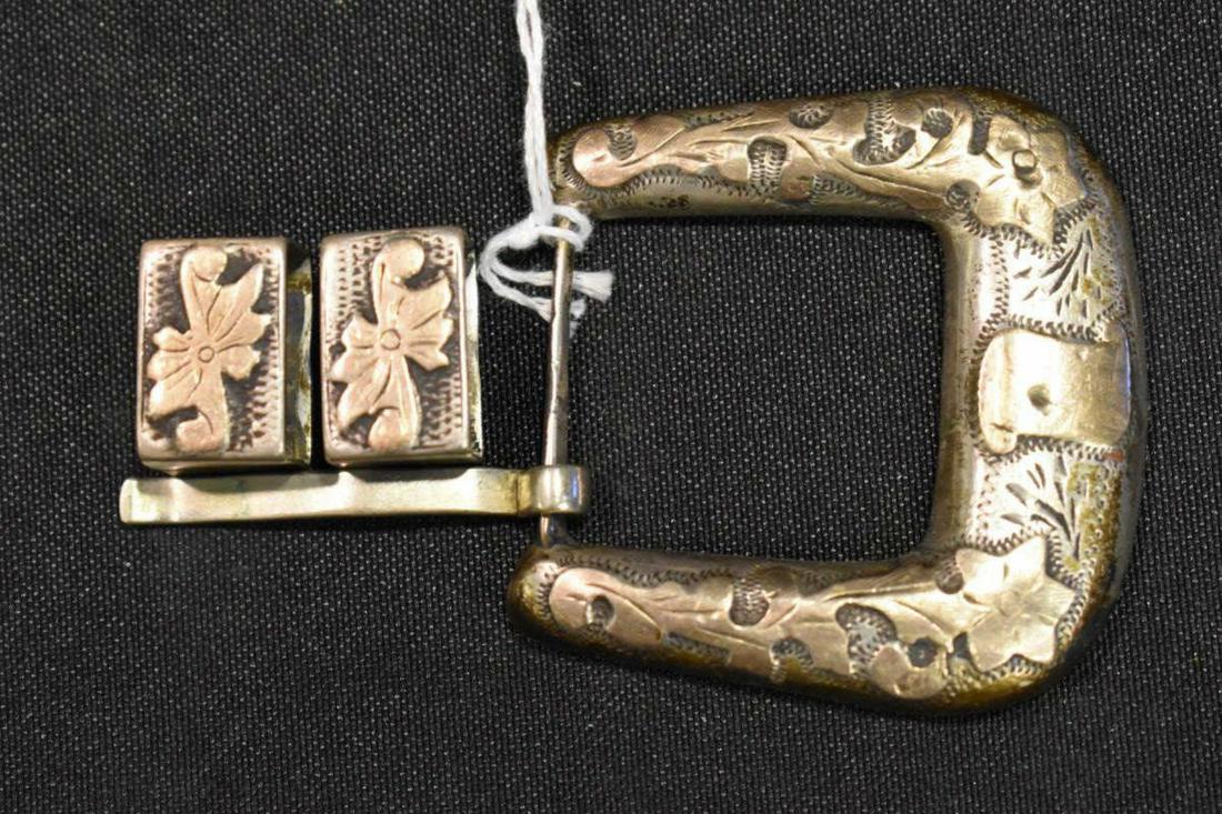 Vintage Ranger Sterling Belt Buckle With Retainers: Vintage Ornate Ranger Sterling Belt Buckle With Twin Retainers. Triangular hallmark from V.H.L.C. Jalisco Guad Mexico. Gold or copper colored accents. Overall weight 76.6grams/2.47 ozs troy. The retai