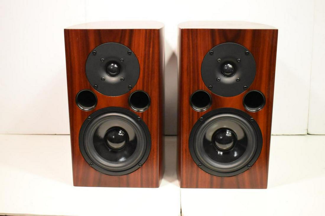 Pair Of LSA 5 Model Speakers: Pair Of LSA 5 Model Speakers. Signature bookshelf speakers. Rosewood pair. Stands 13" high. Serial #11SP003470. Includes grill cover and cloth bag for grill. Comes with original box. Cord not included