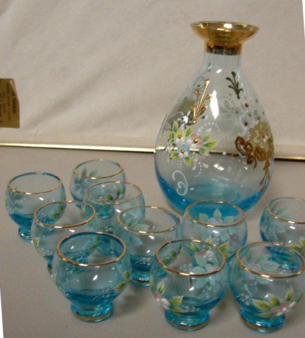 Enameled Blue Glass Decanter & 10 glasses ++: Enameled Blue Glass Decanter, 5.75" tall, and 10 matching small glasses, and a crystal brandy decanter.