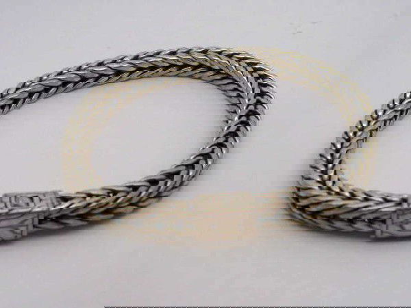 Sterling bracelet by John Hardy: Sterling bracelet by designer John Hardy 57 grams in a 6mm square herringbone design and 81/2" in length.