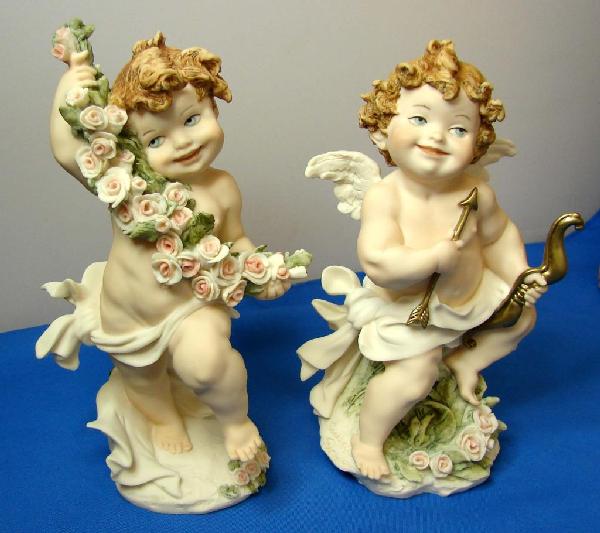 2 Florence Putti Figs. by Giuseppe Armani: 2 Florence Putti figurines by Giuseppe Armani with original boxes; 6.25" tall.
