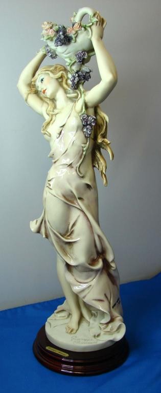 Giuseppe Armani Fig. Lilac & Roses Girl w/flowers: Florence Fig. by Giuseppe Armani Lilac & Roses Girl with Flowers, 16" tall, Ltd. Ed., in original box; no chips, cracks or scratches.
