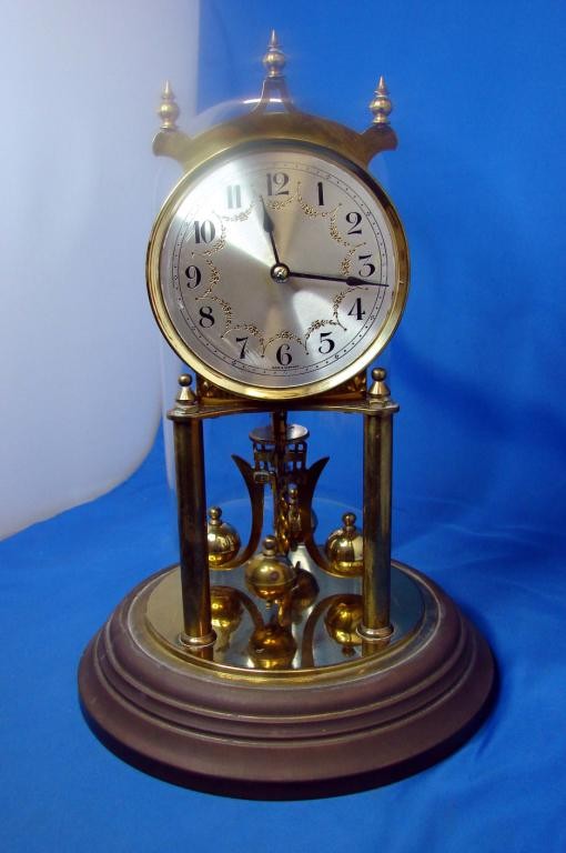 Vintage Gustav Becker German Anniversary Clock: Vintage Gustav Becker German Anniversary Clock with glass dome and key.