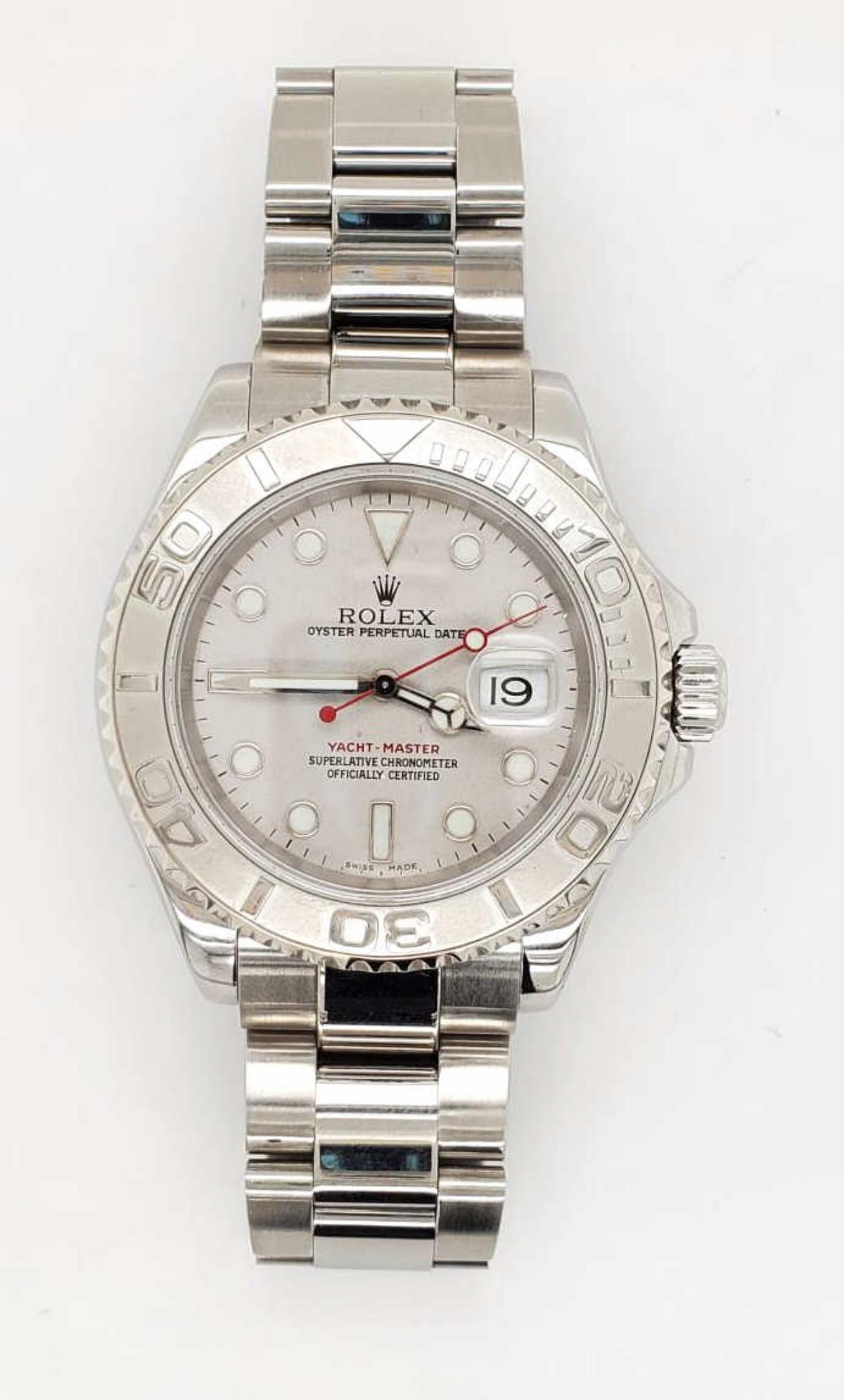 Men's Stainless Steel Rolex Yacht Master: Men's Stainless Steel Rolex Yacht Master watch, model# 16622, featuring an automatic movement, oyster bracelet, sapphire crystal, silver dial with luminescent markers and hands, and platinum bezel. Le