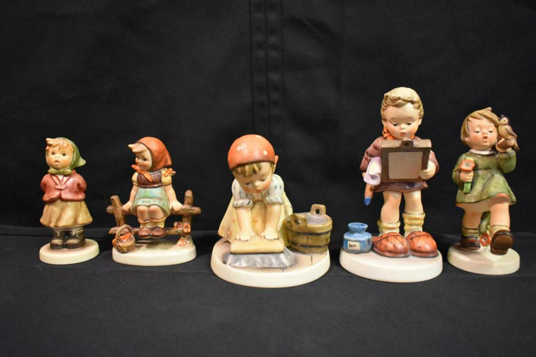Group Of Hummel Figurines: Group Of Hummel Figurines. Total of 5 figurines in the group. Consists of Art Critic. Big Housecleaning. Joyful Adventure. Clear As A Bell. Just Resting. Sizes range from 4"-6" tall.