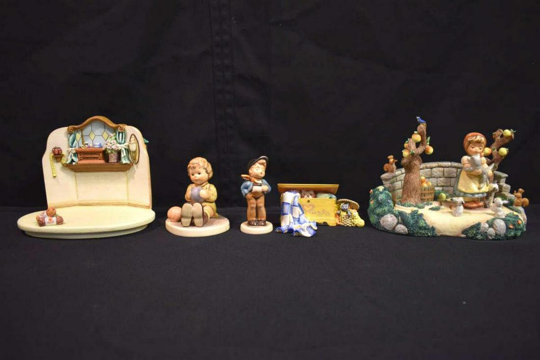 Group Of Hummel Figurines: Group Of Hummel Figurines. Total of 5 figurines in the group. Consists of Small Hope Chest. Quilting Bee. Lucky Fellow. At Play. Kinder Park which includes Tender Love. Sizes range from 3 1/2"-6" tall