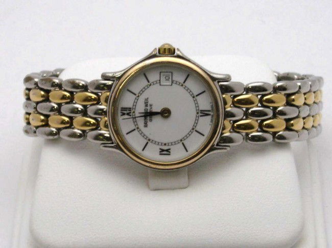 Lady's 2tone Raymond Weil watch: Lady's 2tone Raymond Weil quartz watch with white enamel roman dial with date, Swiss movement, water resistant and 2tone panther link bracelet.