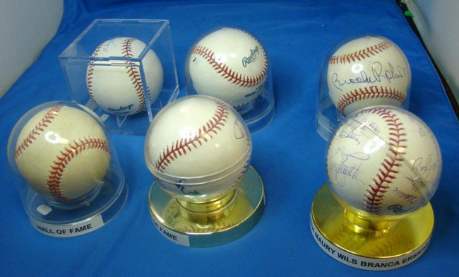 6 Signed Baseballs: Yogi, DiMaggio, Reggie Smith: 6 Signed Baseballs: Hall of Fame: Duke Snider, Garvey, Reggie Smith, Maury Wils, Ralph Branca, Erskine, Rick Monday; Alex Rodriguez; Yogi Berra; Brooks Robinson; Dom DiMaggio; and Carl Yastrzemski.