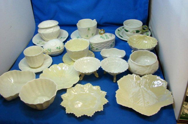 25 pcs. Belleek - Cups & saucers, shell dish, ++: Lot of Belleek including 4 sets of cups & saucers (2 grn. & 2 brn mark), shell dish, heart dish, bunny egg, cov'd boxes, leaf dish, footed dishes, etc. One cup (center in pic.) has chip on rim. All ot